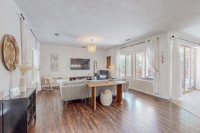 5716 Strand Loop SE, Albuquerque, NM 87106 - living room with wood finished floors and a textured ceiling