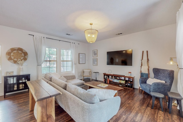 5716 Strand Loop SE, Albuquerque, NM 87106 - living area with dark wood-style flooring and baseboards