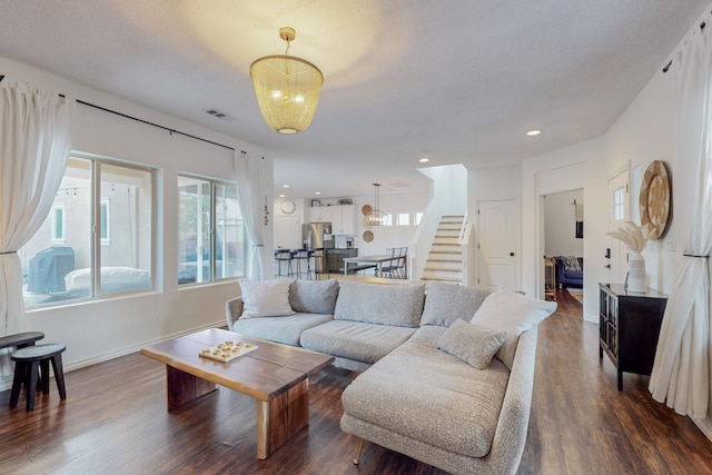 5716 Strand Loop SE, Albuquerque, NM 87106 - living area featuring stairway, dark wood-style flooring, and recessed lighting