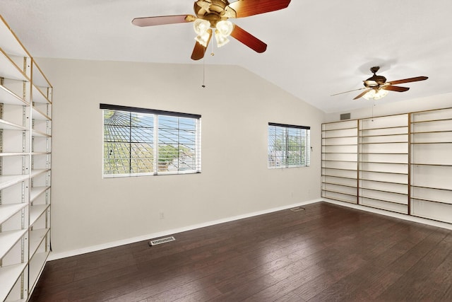 9900 Ladder Ranch Ln SW, Albuquerque, NM 87121 - unfurnished bedroom featuring lofted ceiling and dark wood finished floors