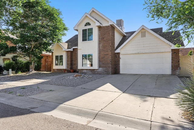 7816 Bursera Dr NW, Albuquerque, NM 87120 - traditional-style home with brick siding, roof with shingles, concrete driveway, and an attached garage