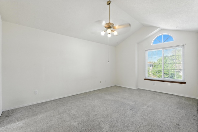 7816 Bursera Dr NW, Albuquerque, NM 87120 - carpeted spare room with vaulted ceiling and ceiling fan
