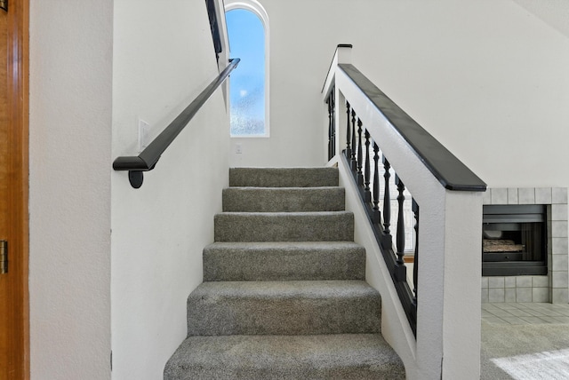 7816 Bursera Dr NW, Albuquerque, NM 87120 - staircase with a fireplace