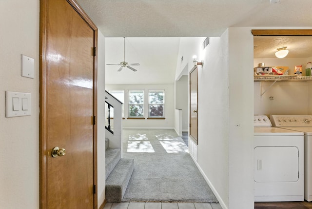 7816 Bursera Dr NW, Albuquerque, NM 87120 - corridor featuring light colored carpet, stairs, washer and dryer, and a textured ceiling