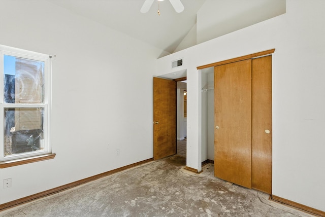 7816 Bursera Dr NW, Albuquerque, NM 87120 - unfurnished bedroom featuring vaulted ceiling, a closet, concrete floors, and a ceiling fan