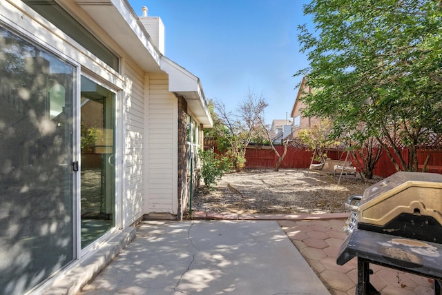7816 Bursera Dr NW, Albuquerque, NM 87120 - fenced backyard with a patio