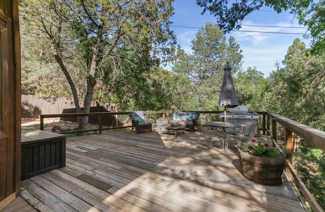 113 Sandia Crest Rd, Sandia Park, NM 87047 - wooden terrace with an outdoor living space and grilling area
