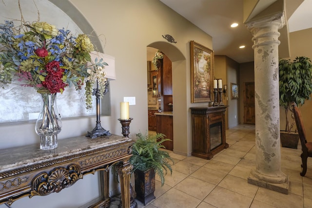 9604 Big Sage Dr NW, Albuquerque, NM 87114 - entryway featuring light tile patterned floors, recessed lighting, and ornate columns