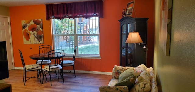 2800 Vail Ave SE Unit M 163, Albuquerque, NM 87106 - dining area with healthy amount of natural light and wood finished floors