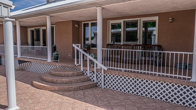 40 La Bajada Rd, Los Lunas, NM 87031 - property entrance featuring stucco siding