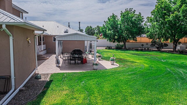 40 La Bajada Rd, Los Lunas, NM 87031 - fenced backyard with a gazebo and a patio
