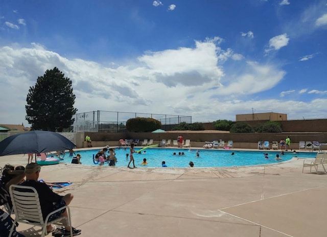 10027 Vista Cantera Ln NW, Albuquerque, NM 87114 - community pool featuring a patio