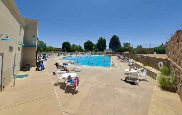10027 Vista Cantera Ln NW, Albuquerque, NM 87114 - community pool featuring a patio
