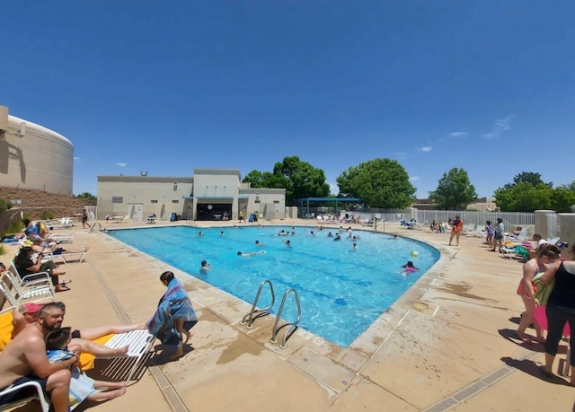 10027 Vista Cantera Ln NW, Albuquerque, NM 87114 - community pool featuring a patio