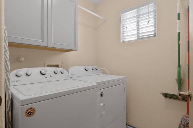 10027 Vista Cantera Ln NW, Albuquerque, NM 87114 - laundry room featuring separate washer and dryer and cabinet space