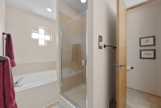 10027 Vista Cantera Ln NW, Albuquerque, NM 87114 - full bathroom with a shower stall and a garden tub