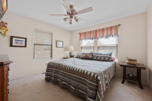 10027 Vista Cantera Ln NW, Albuquerque, NM 87114 - carpeted bedroom featuring ceiling fan