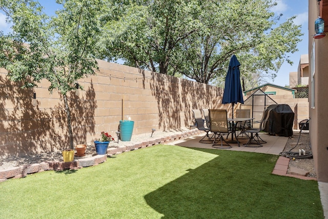 10027 Vista Cantera Ln NW, Albuquerque, NM 87114 - fenced backyard with a patio