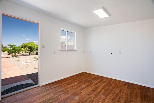 5 Ocotillo Way, Placitas, NM 87043 - empty room with wood finished floors and baseboards