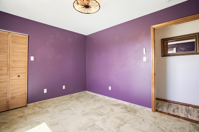 5 Ocotillo Way, Placitas, NM 87043 - unfurnished bedroom featuring a closet and baseboards
