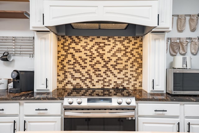 5 Ocotillo Way, Placitas, NM 87043 - kitchen with stainless steel appliances, custom exhaust hood, white cabinets, and dark countertops