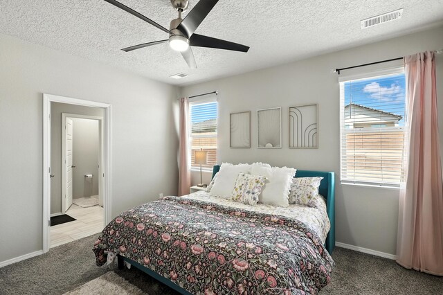 583 Turmalina Dr SE, Rio Rancho, NM 87124 - dining area with ceiling fan and a textured ceiling