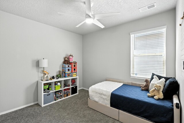 583 Turmalina Dr SE, Rio Rancho, NM 87124 - carpeted bedroom featuring a textured ceiling and ceiling fan