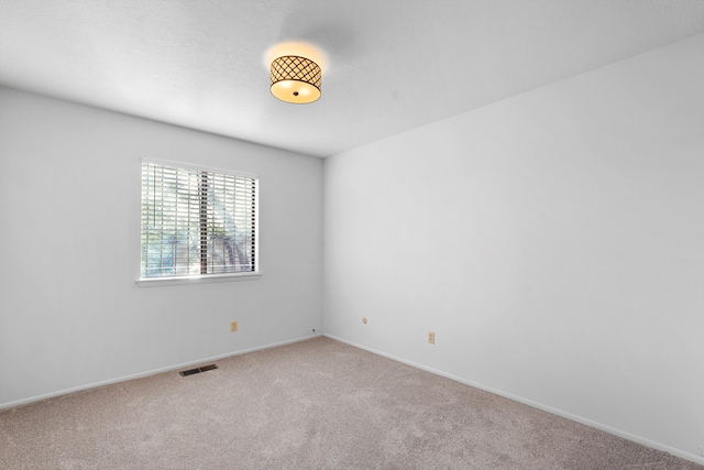 504 Ortiz Dr NE, Albuquerque, NM 87108 - carpeted spare room with baseboards