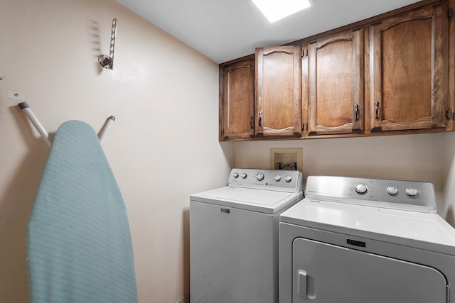 504 Ortiz Dr NE, Albuquerque, NM 87108 - laundry room with separate washer and dryer and cabinet space