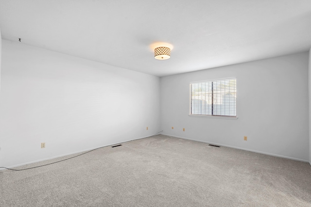 504 Ortiz Dr NE, Albuquerque, NM 87108 - carpeted empty room with baseboards