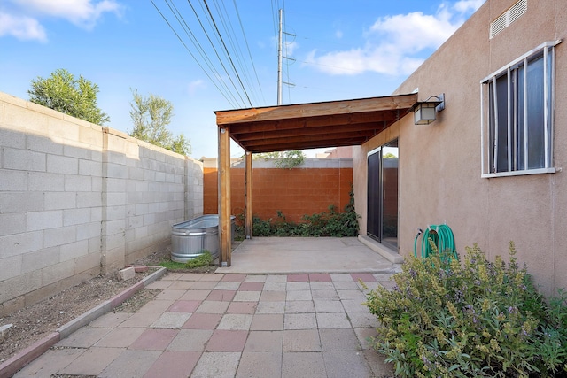504 Ortiz Dr NE, Albuquerque, NM 87108 - fenced backyard with a patio