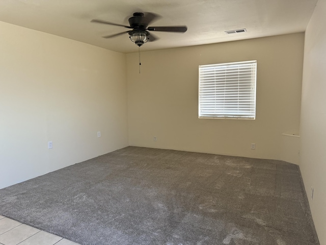 4 Los Chavez Park Rd, Belen, NM 87002 - carpeted empty room with a ceiling fan
