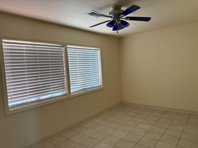 4 Los Chavez Park Rd, Belen, NM 87002 - spare room featuring a ceiling fan and light tile patterned floors