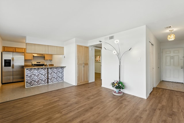 4200 Montgomery Blvd NE Unit 109, Albuquerque, NM 87109 - unfurnished living room with wood finished floors