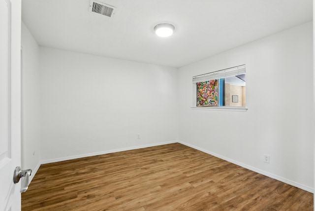 4200 Montgomery Blvd NE Unit 109, Albuquerque, NM 87109 - spare room featuring wood finished floors and baseboards