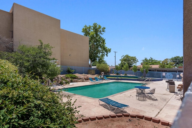 4200 Montgomery Blvd NE Unit 109, Albuquerque, NM 87109 - community pool with a patio area