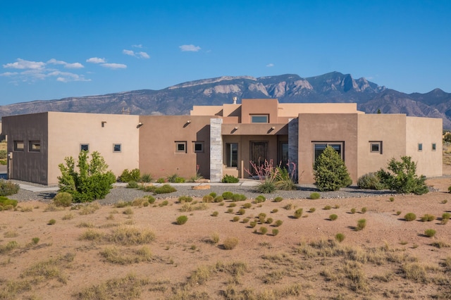 24 Norte Trl, Placitas, NM 87043 - southwest-style home with a mountain view and stucco siding