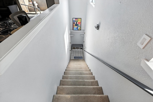 4801 Irving Blvd NW Unit 304, Albuquerque, NM 87114 - stairway featuring a textured wall