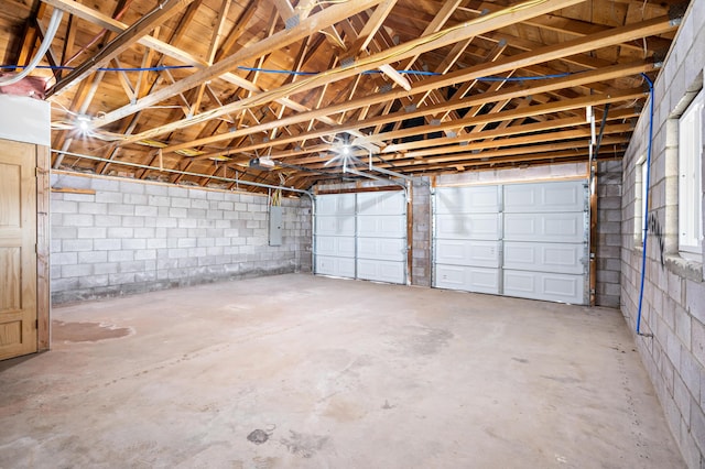 19 Bobcat Hill Rd, Sandia Park, NM 87047 - garage with concrete block wall and electric panel