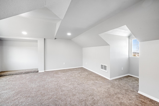 19 Bobcat Hill Rd, Sandia Park, NM 87047 - additional living space featuring lofted ceiling, carpet, and recessed lighting