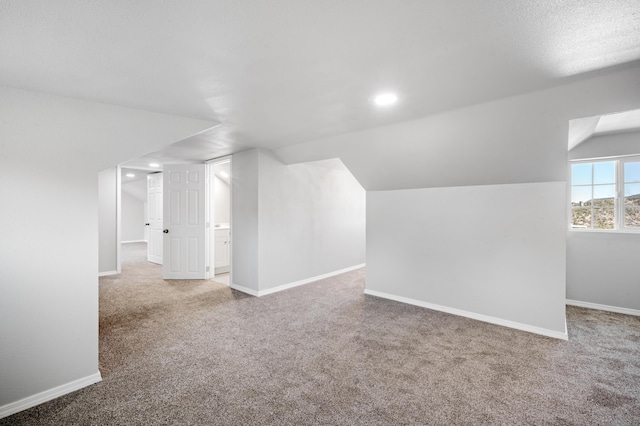 19 Bobcat Hill Rd, Sandia Park, NM 87047 - bonus room featuring carpet flooring, vaulted ceiling, and recessed lighting
