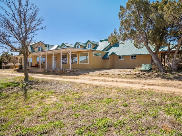 19 Bobcat Hill Rd, Sandia Park, NM 87047 - view of front of property with a porch