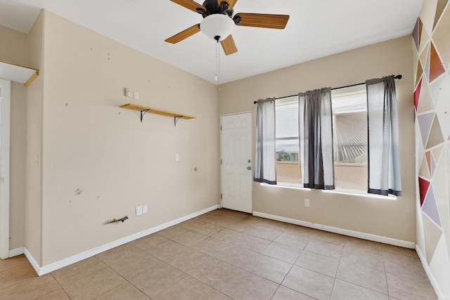 228 18th St SW, Rio Rancho, NM 87124 - spare room featuring tile patterned floors and a ceiling fan