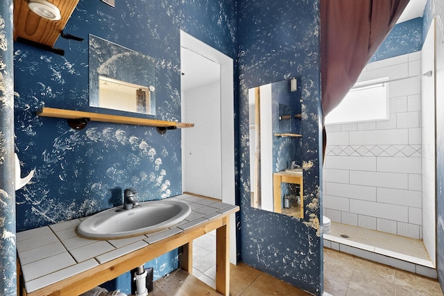 228 18th St SW, Rio Rancho, NM 87124 - full bathroom featuring a stall shower, tile patterned flooring, and wallpapered walls