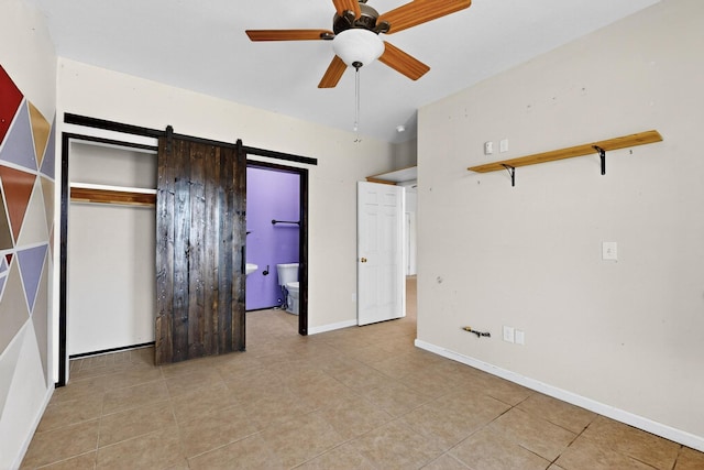 228 18th St SW, Rio Rancho, NM 87124 - unfurnished bedroom featuring tile patterned flooring and a closet