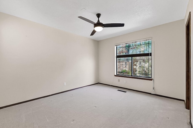 12800 Comanche Rd NE Unit 23, Albuquerque, NM 87111 - carpeted empty room featuring ceiling fan and baseboards