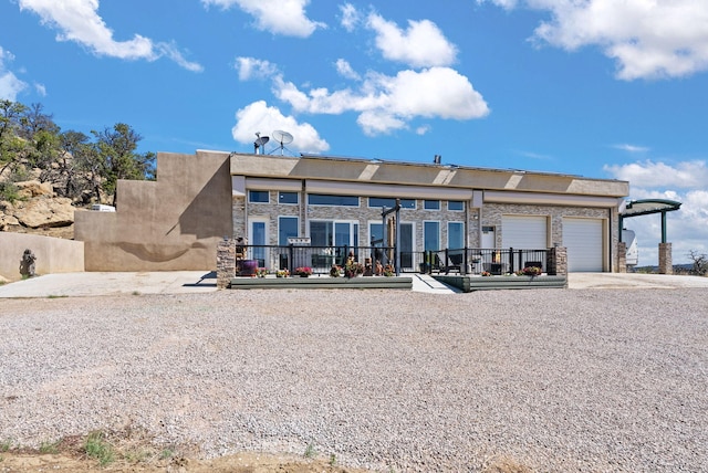 343 Webb Ranch Rd, Pie Town, NM 87827 - back of property with driveway and a garage