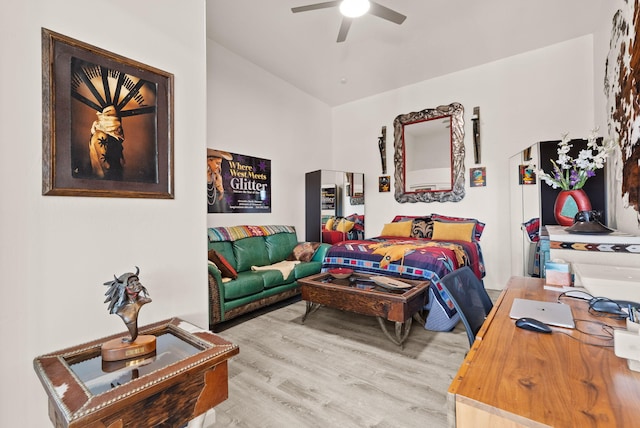 343 Webb Ranch Rd, Pie Town, NM 87827 - bedroom with vaulted ceiling, wood finished floors, and a ceiling fan