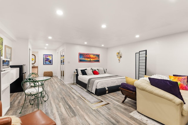 343 Webb Ranch Rd, Pie Town, NM 87827 - bedroom featuring light wood-style floors and recessed lighting