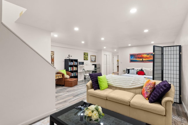 343 Webb Ranch Rd, Pie Town, NM 87827 - living room with wood finished floors, recessed lighting, and stairway